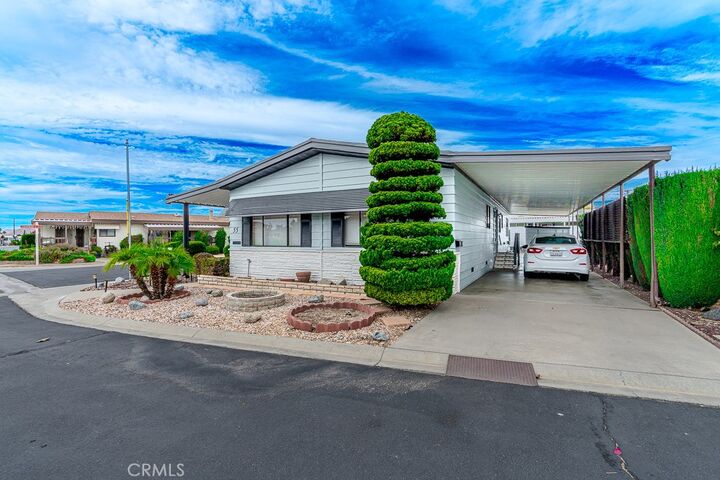 Property Photo:  1300 W Menlo Avenue 55  CA 92543 