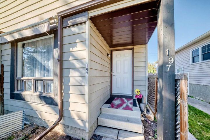 Property Photo:  197 Cedardale Road SW  AB T2W 5A8 