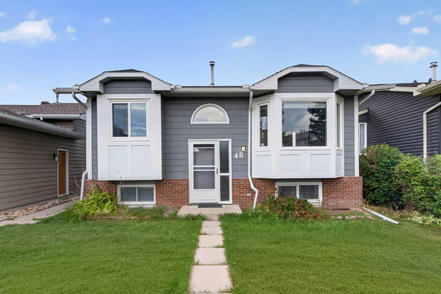 Property Photo: 48 Shawfield Road SW AB T2Y 1Y7
