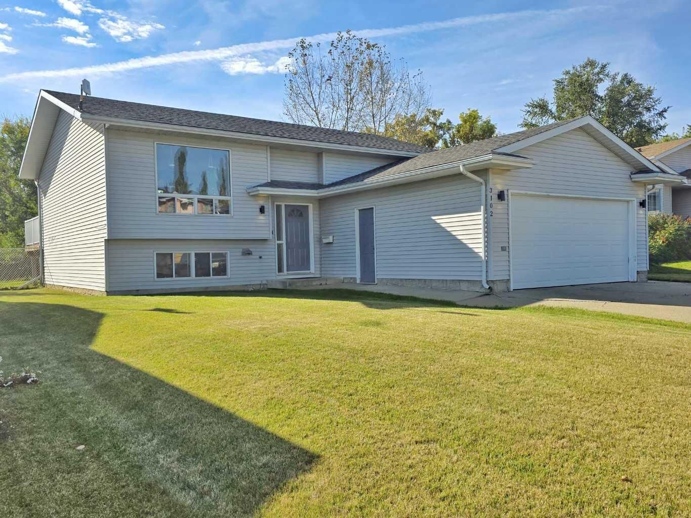 Property Photo:  3102 47 Avenue  AB T9S 2A6 