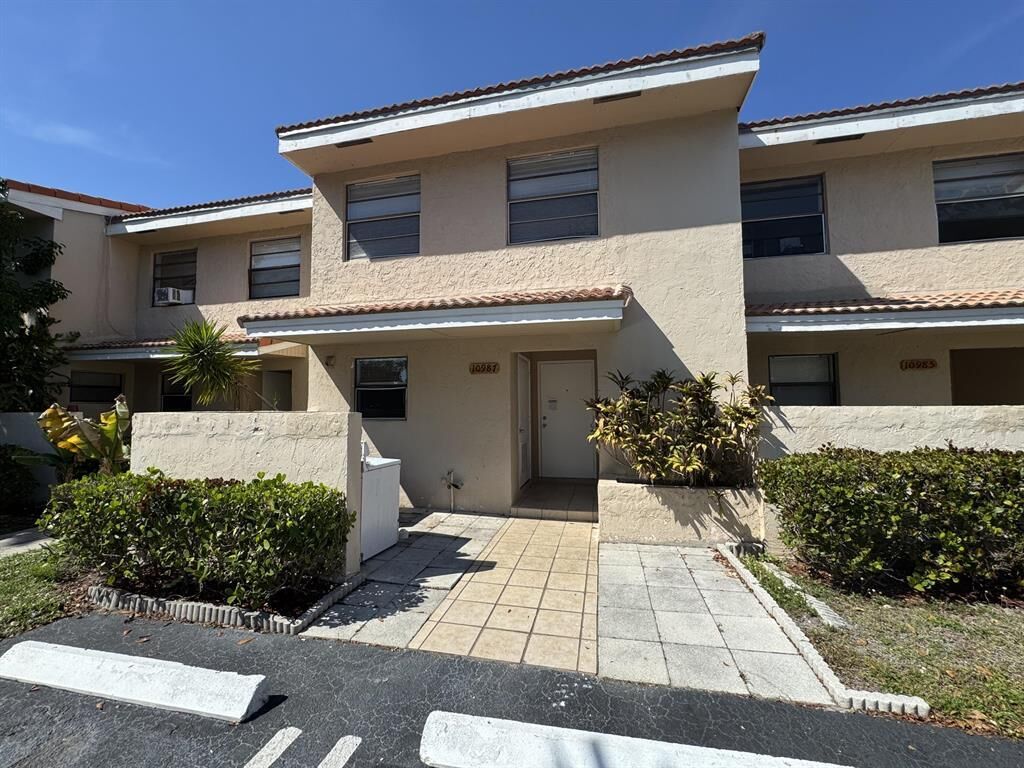 Property Photo:  10987 Royal Palm Boulevard 9  FL 33065 