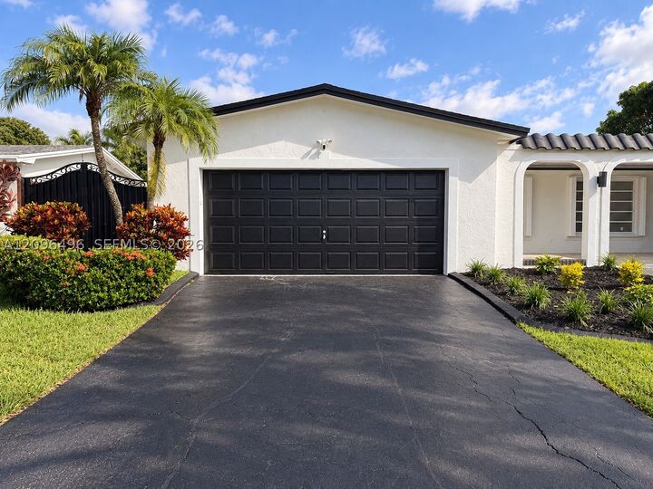 Property Photo:  11701 NW 14th St  FL 33026 