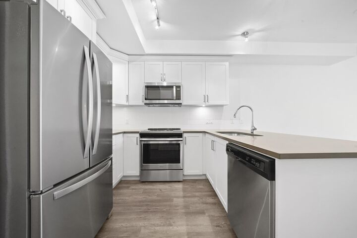 Property Photo: 2436 Kelly Avenue 304 BC V3C 1Y4