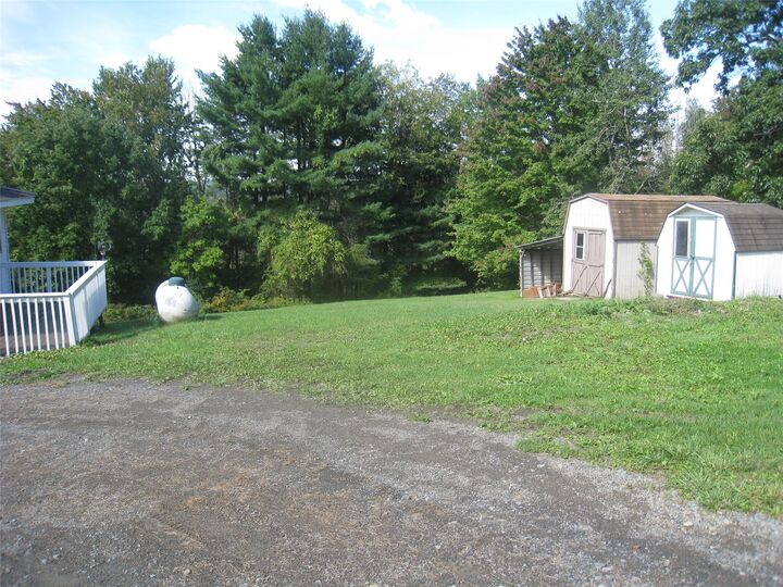 Property Photo:  7 N Brotzman Road  NY 13744 