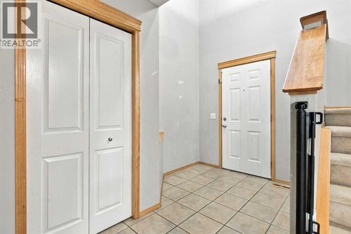 Property Photo:  209 Tuscany Ravine Road Northwest  AB T3L 2W9 