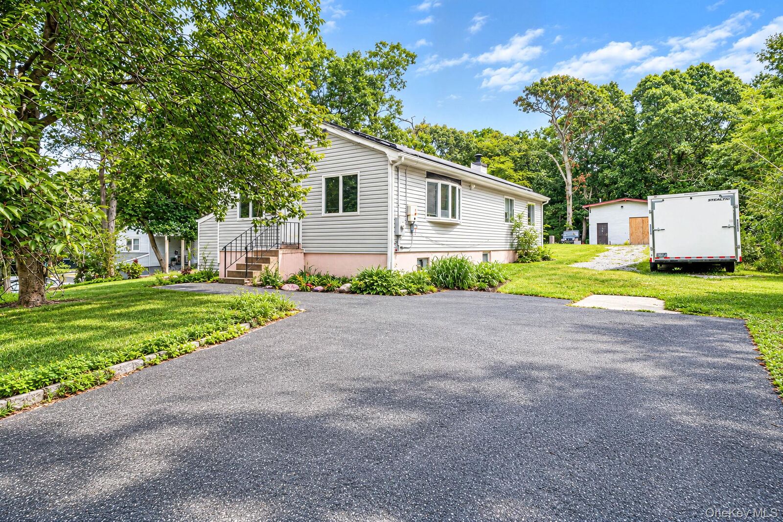 Property Photo: 95 W Bartlett Road NY 11953
