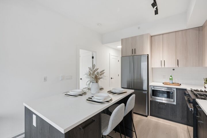Property Photo:  1100 Clarke Road 106  BC V3H 0N3 