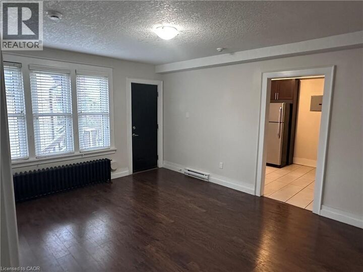 Property Photo:  58 Madison Avenue North 203  ON N2H 2Z6 