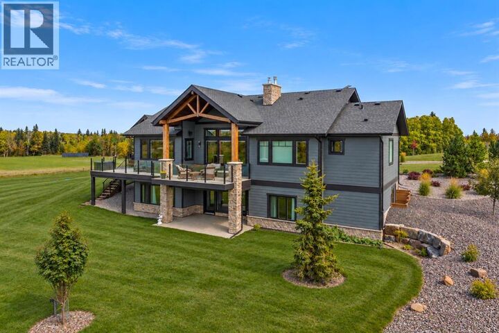 Property Photo:  252138 2157 Drive West  AB T0L 1W2 