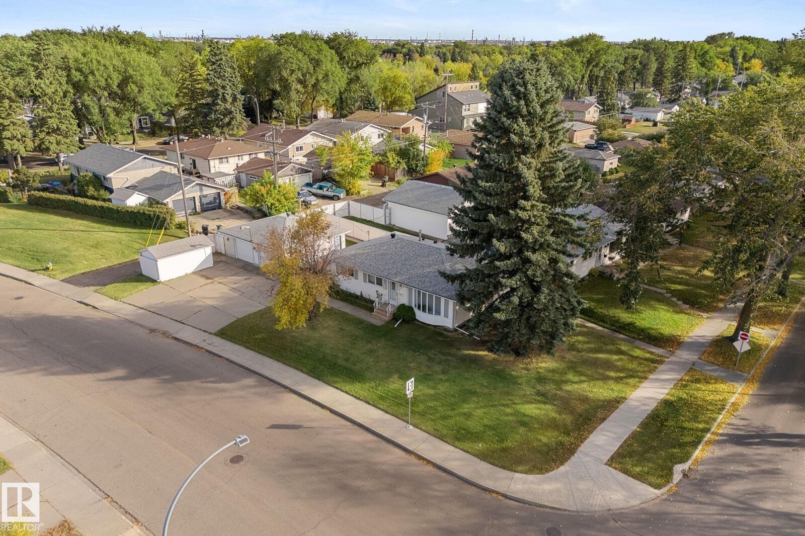 Property Photo:  12227 58 Street NW  AB T5W 3X6 