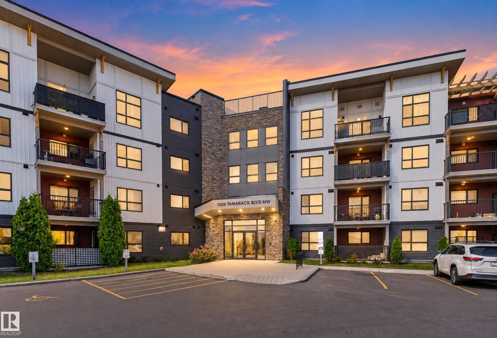 Property Photo: 1506 Tamarack Boulevard NW 205 AB T6T 2J5