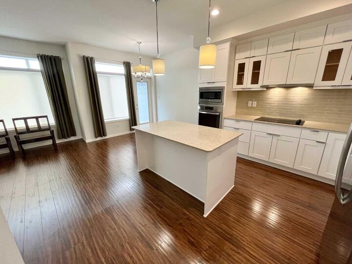 Property Photo:  430 Highlands Boulevard W 3  AB T1J 5K5 
