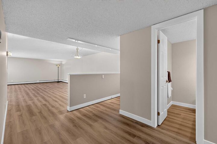 Property Photo:  2425 90 Avenue SW 118  AB T2V 4X8 