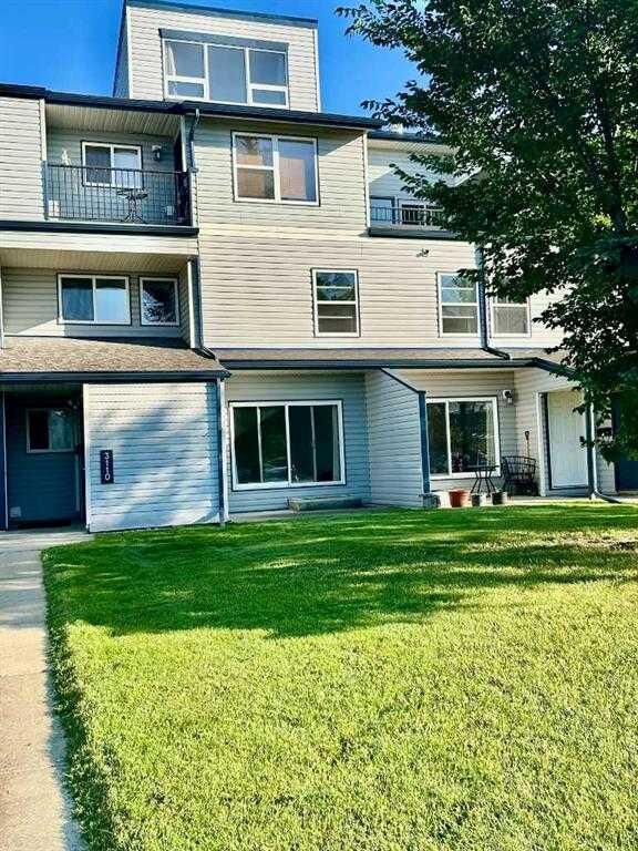 Property Photo:  7201 Poplar Drive 3110  AB T8V 6C5 