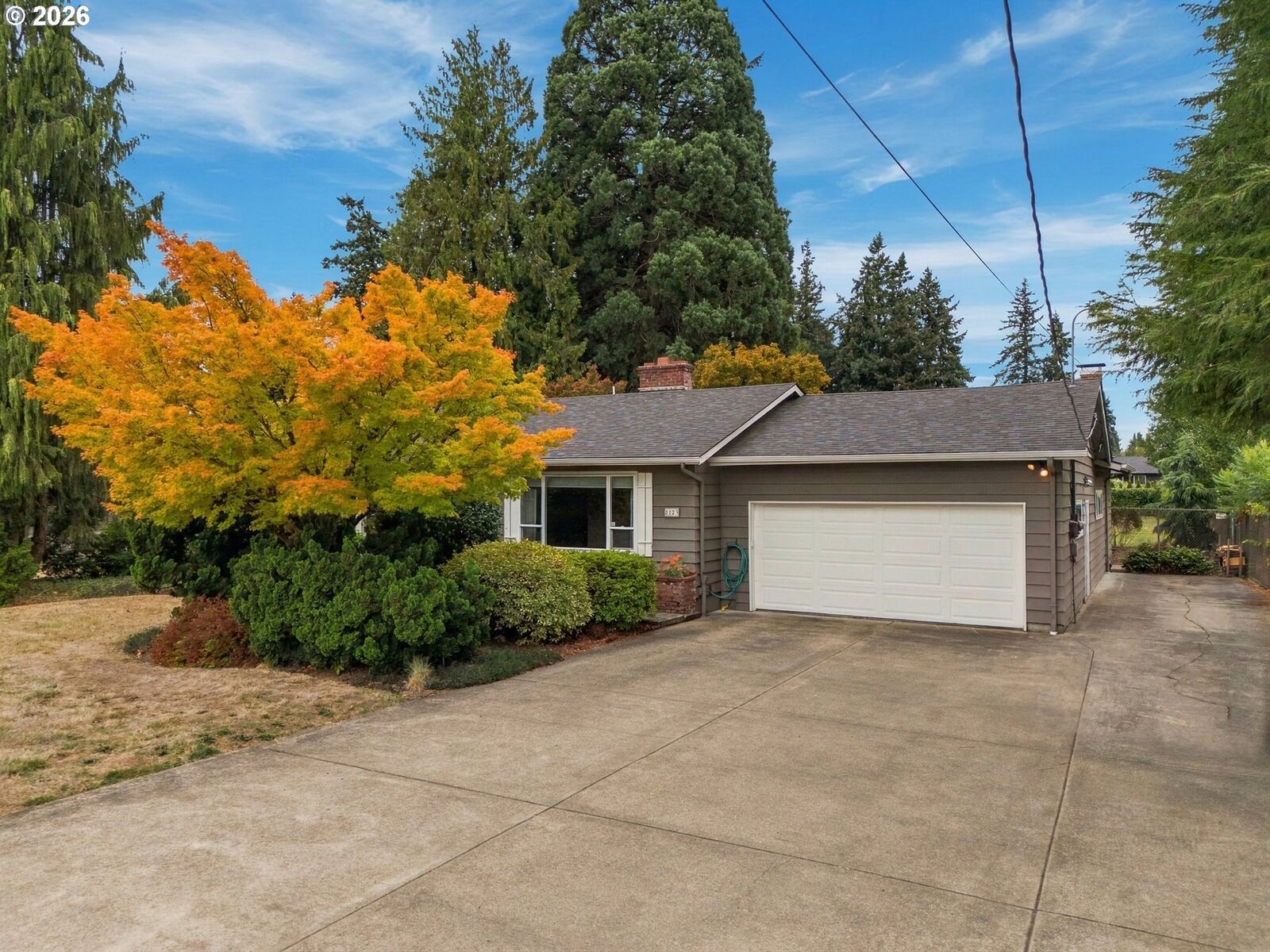 Property Photo:  8123 SE Roots Rd  OR 97267 
