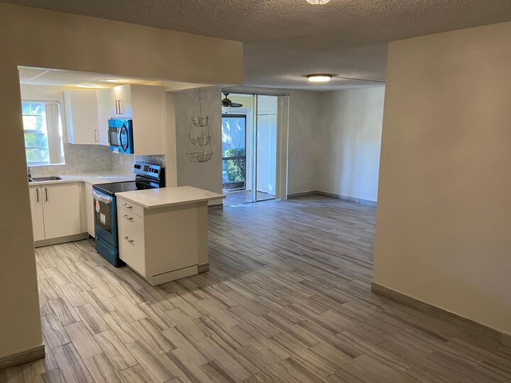 Property Photo:  1301 NW 12th Avenue 320A  FL 33486 