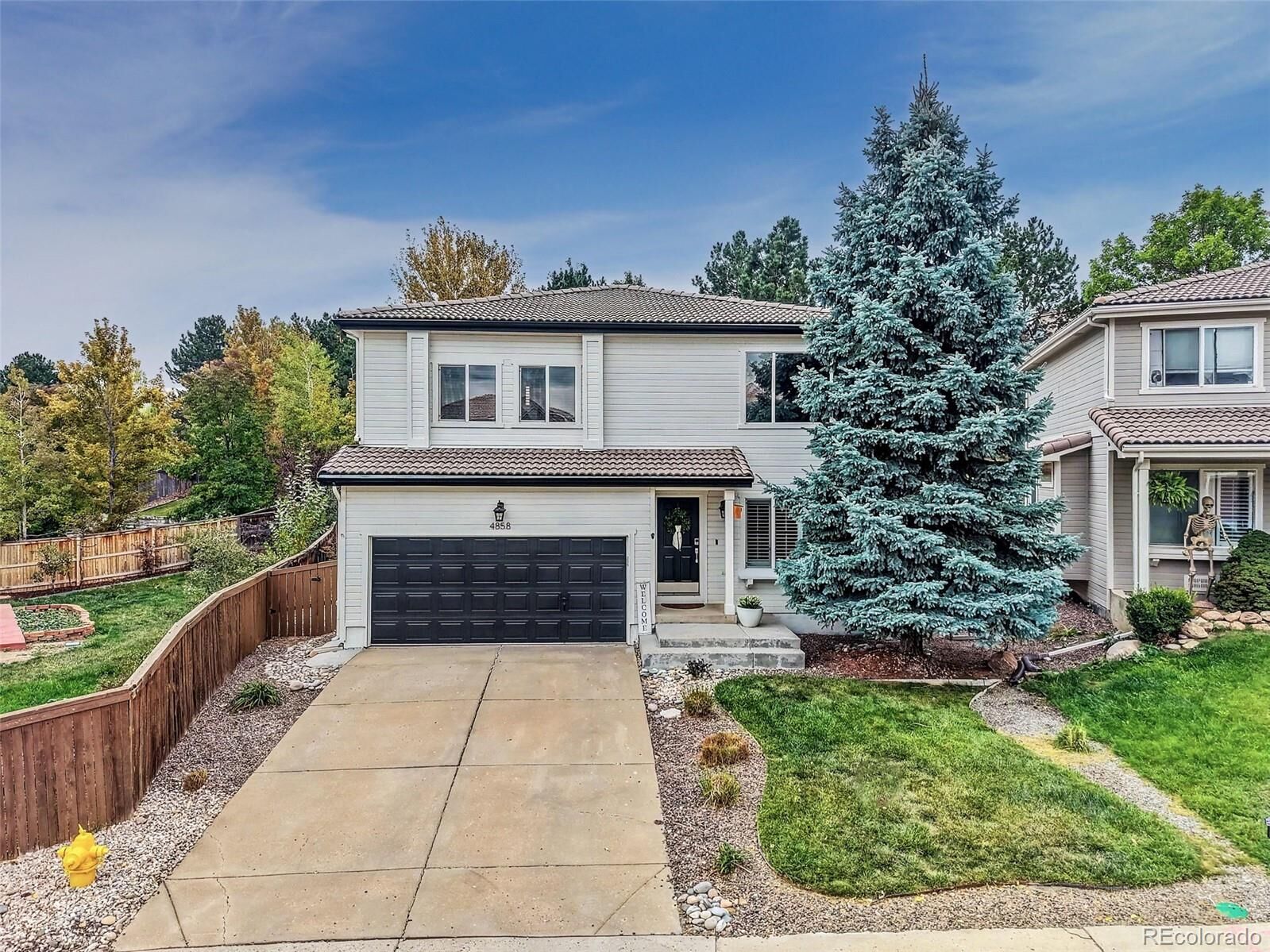Property Photo:  4858 Waldenwood Place  CO 80130 