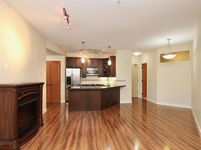 Property Photo: 11935 Burnett Street 217 BC V2X 9A9