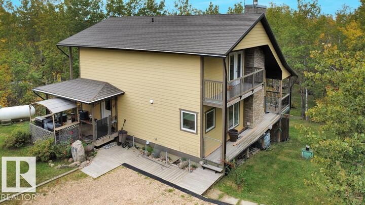 Property Photo:  58532 Rge Rd 113 222 / 220  AB T0A 0C0 