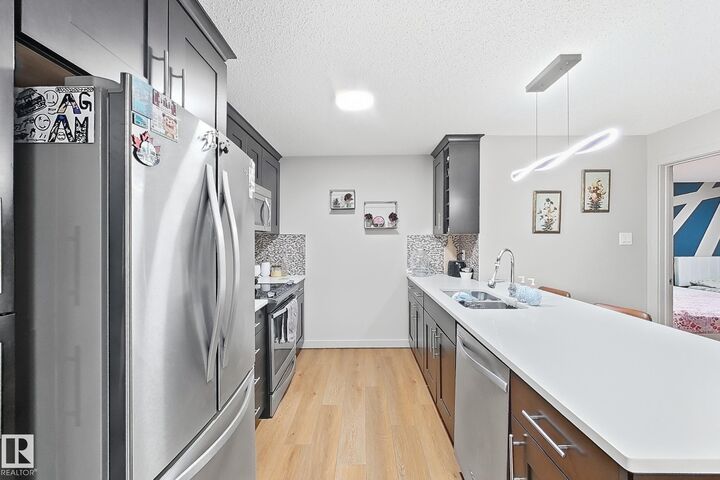 Property Photo:  4008 Savaryn Drive SW 116  AB T6X 2E5 