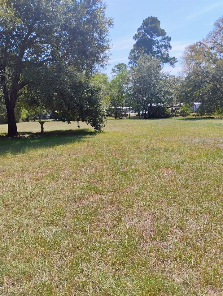 Property Photo: 11 Ross McBride Lane TX 77340