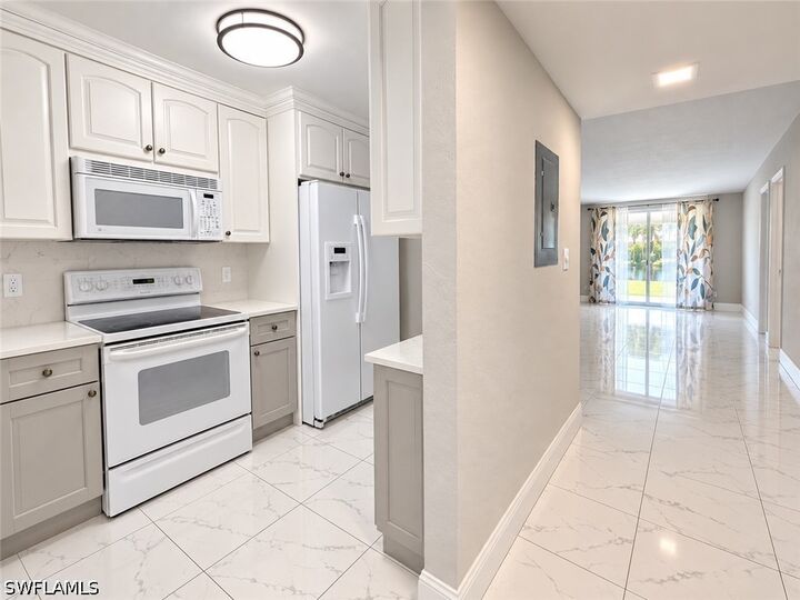Property Photo:  501 Forest Lakes Boulevard 212  FL 34105 
