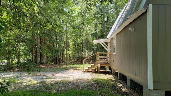 Property Photo:  73211 Plantation Street A  LA 70435 
