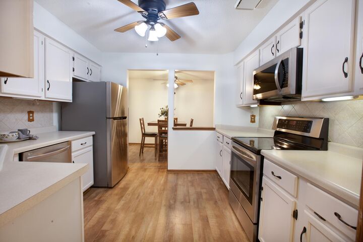 Property Photo:  999 41st Avenue NE 212  MN 55421 
