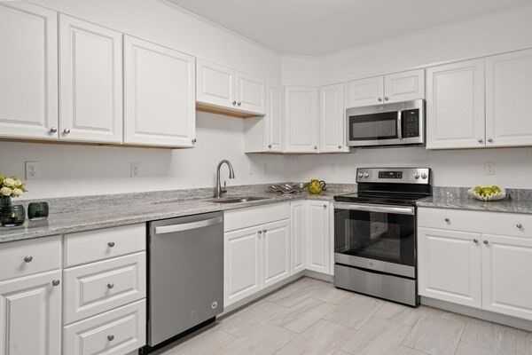 Property Photo: 20 Hammond Pond Pkwy 302 MA 02459
