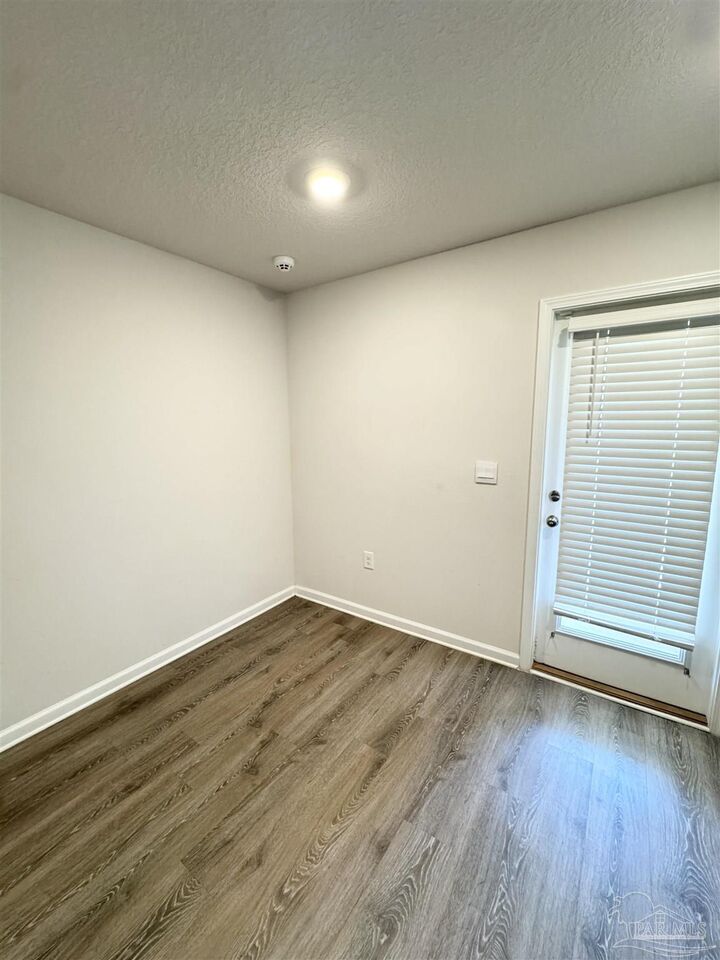 Property Photo:  6311 Burrow Ln  FL 32526 