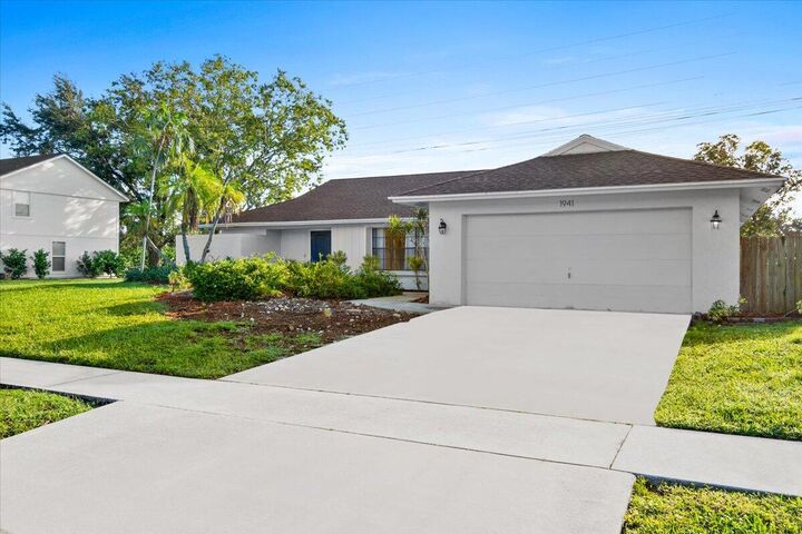 Property Photo:  1941 Shower Tree Way  FL 33414 
