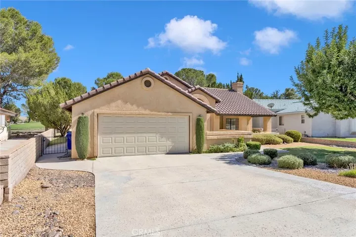 Property Photo:  15001 Blue Grass  CA 92342 