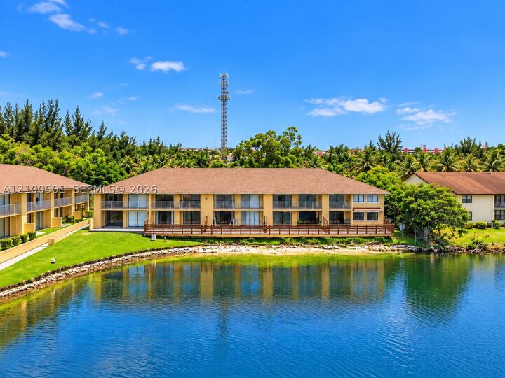 Property Photo:  400 NW 214 St 104-22  FL 33169 
