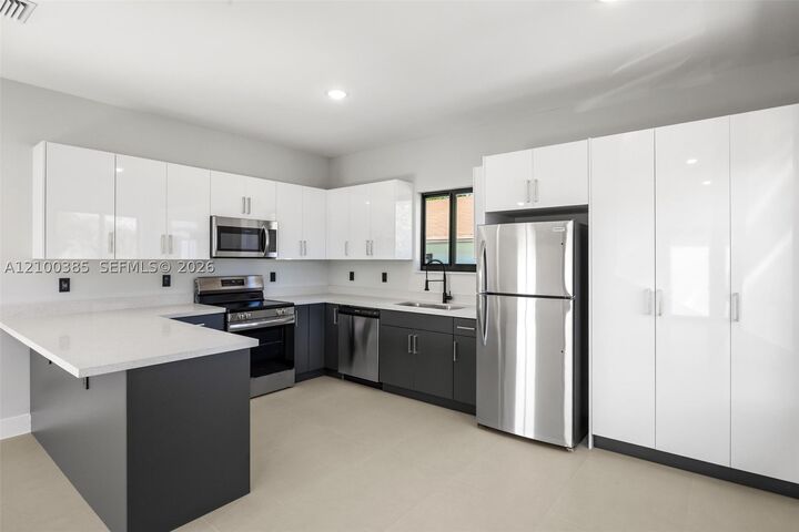 Property Photo:  601 NW 3rd Ave A  FL 33009 