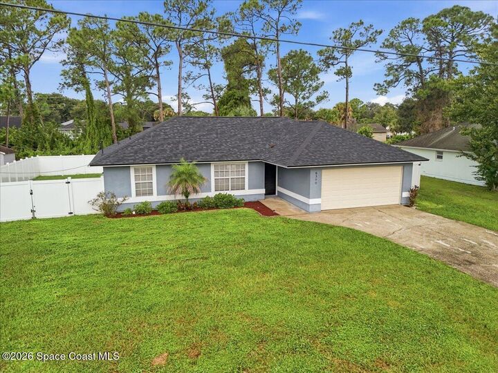 Property Photo:  6390 Gillette Avenue  FL 32927 
