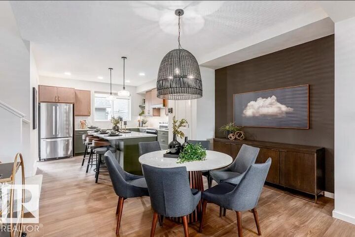 Property Photo:  20907 25 Avenue NW  AB T6M 2K7 
