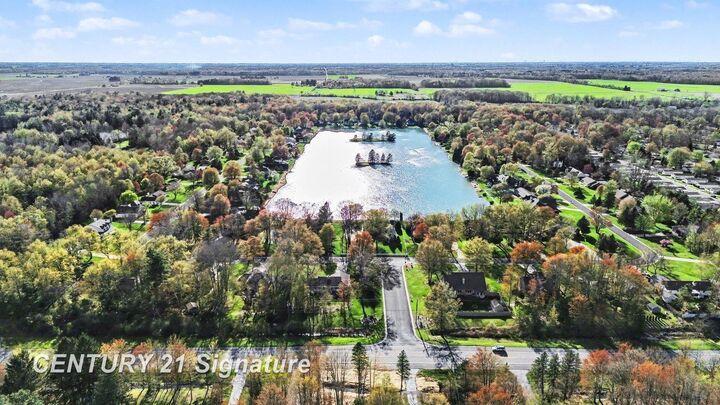 Property Photo:  1944 E Lake Circle Drive  MI 48609 