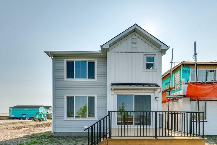 Property Photo:  532 Buffaloberry Manor SE  AB T3M 4G6 