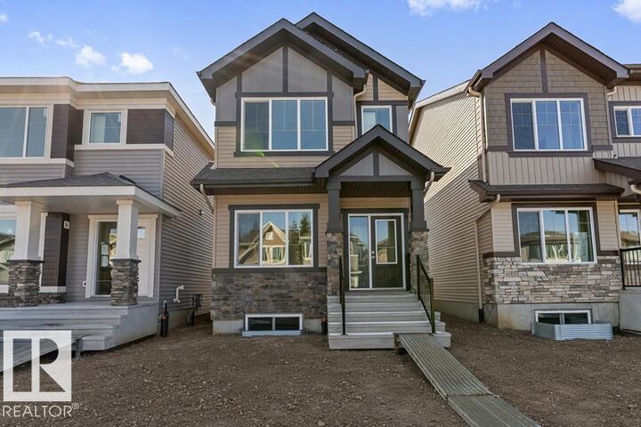 Property Photo:  20707 43 Av NW  AB T6M 3E3 
