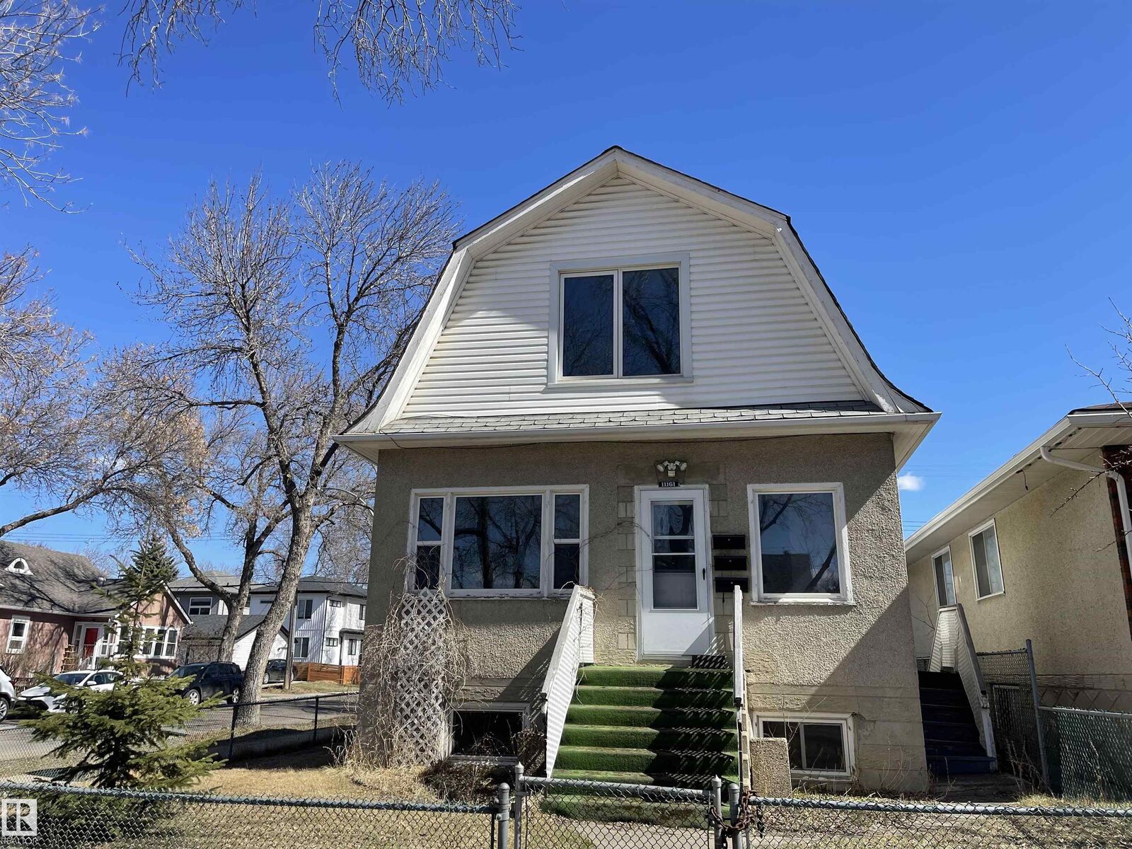 Property Photo:  11161 96 Street NW  AB T5G 1S8 