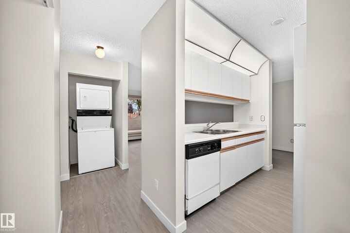 Property Photo:  11620 9A Avenue NW 109  AB T6J 7B4 