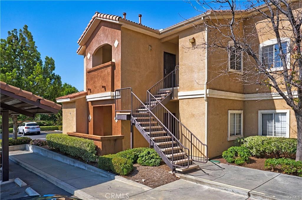Property Photo:  24909 Madison 2621  CA 92562 