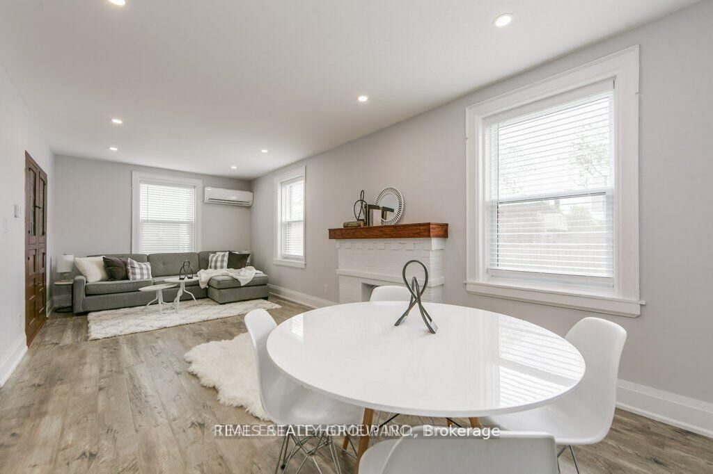 Property Photo:  1492 Dundas Street E 1  ON M4M 1S9 