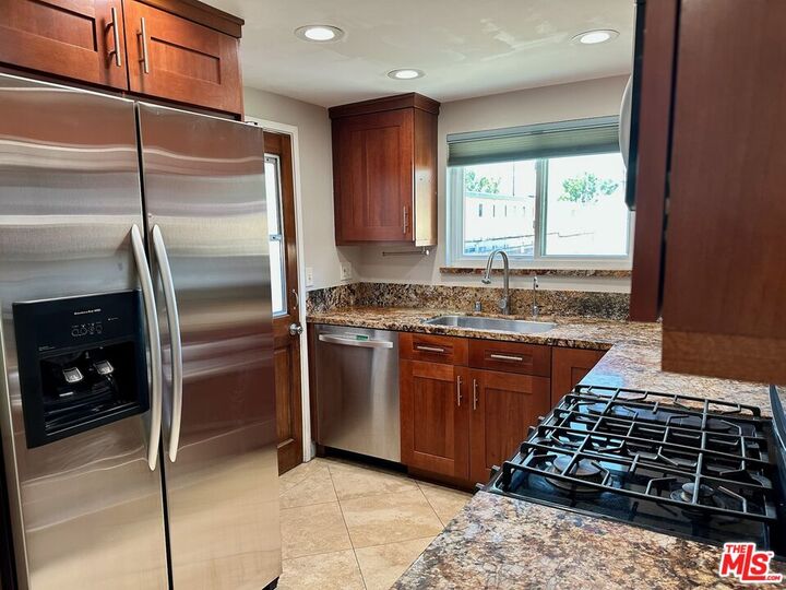 Property Photo:  13621 Valerio St, Unit D  CA 91405 