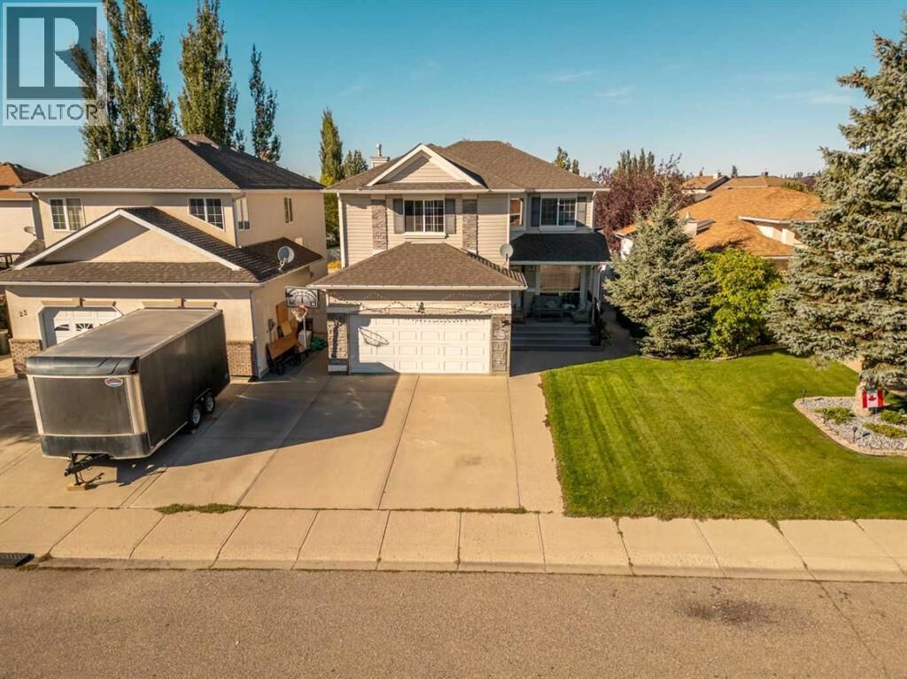 Property Photo:  27 Fairmont Garden Road South  AB T1K 7L2 