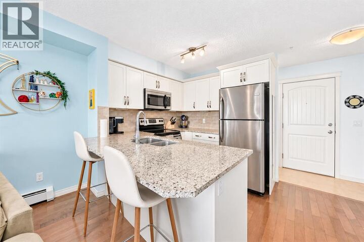 Property Photo: 115 Prestwick Villas Southeast AB T2Z 0M7