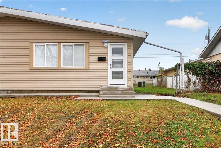 Property Photo:  13246 59 St NW  AB T5A 0R7 