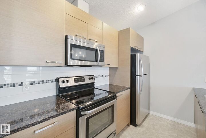 Property Photo:  9351 Simpson Drive NW 3415  AB T6R 0N4 