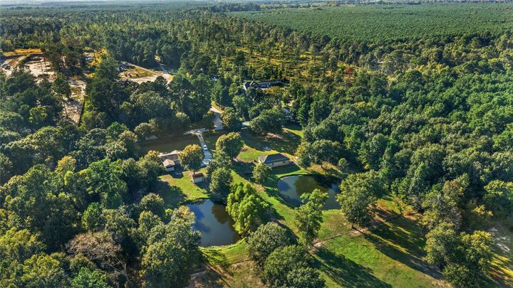 Property Photo:  448 County Road 2235  TX 77327 