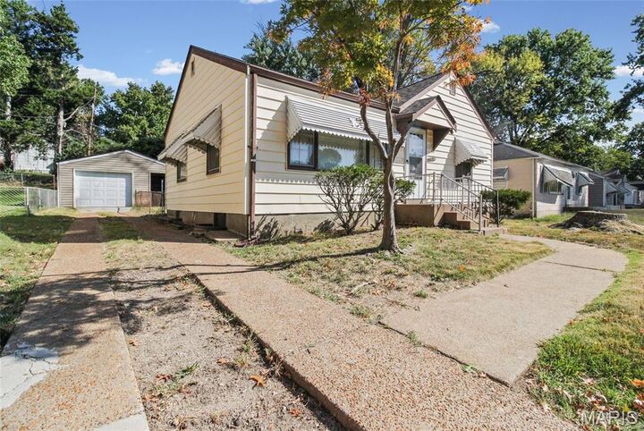 Property Photo:  7839 Underhill Drive  MO 63133 